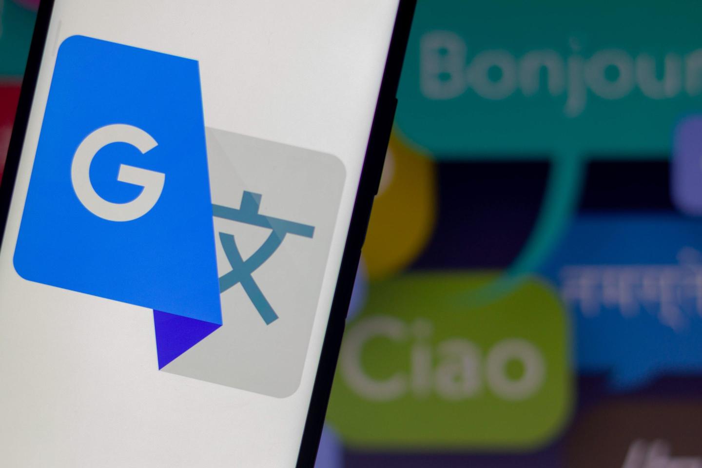Google Translate logo shown on a phone