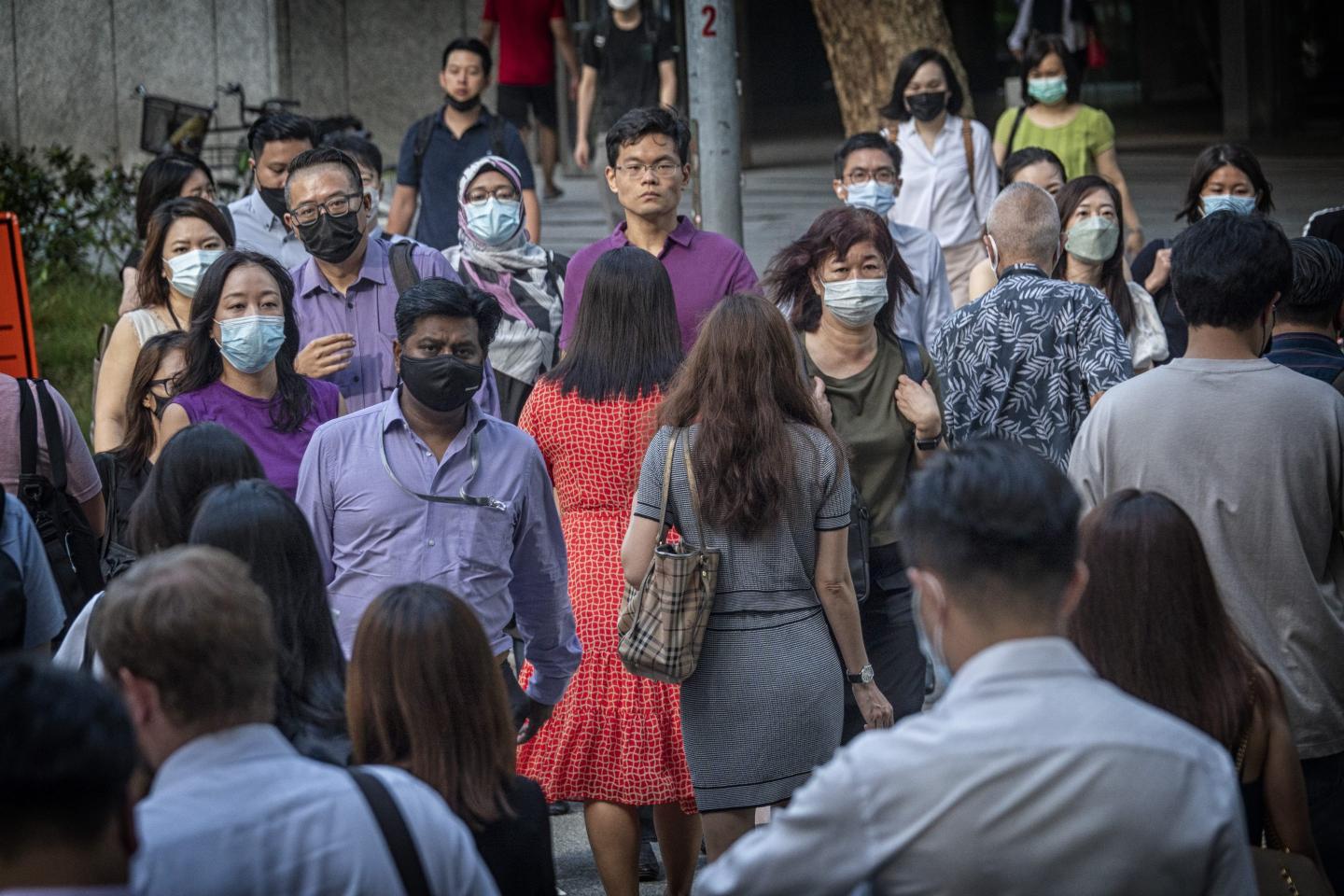 Masked pedestrians in Singapore in April 2022