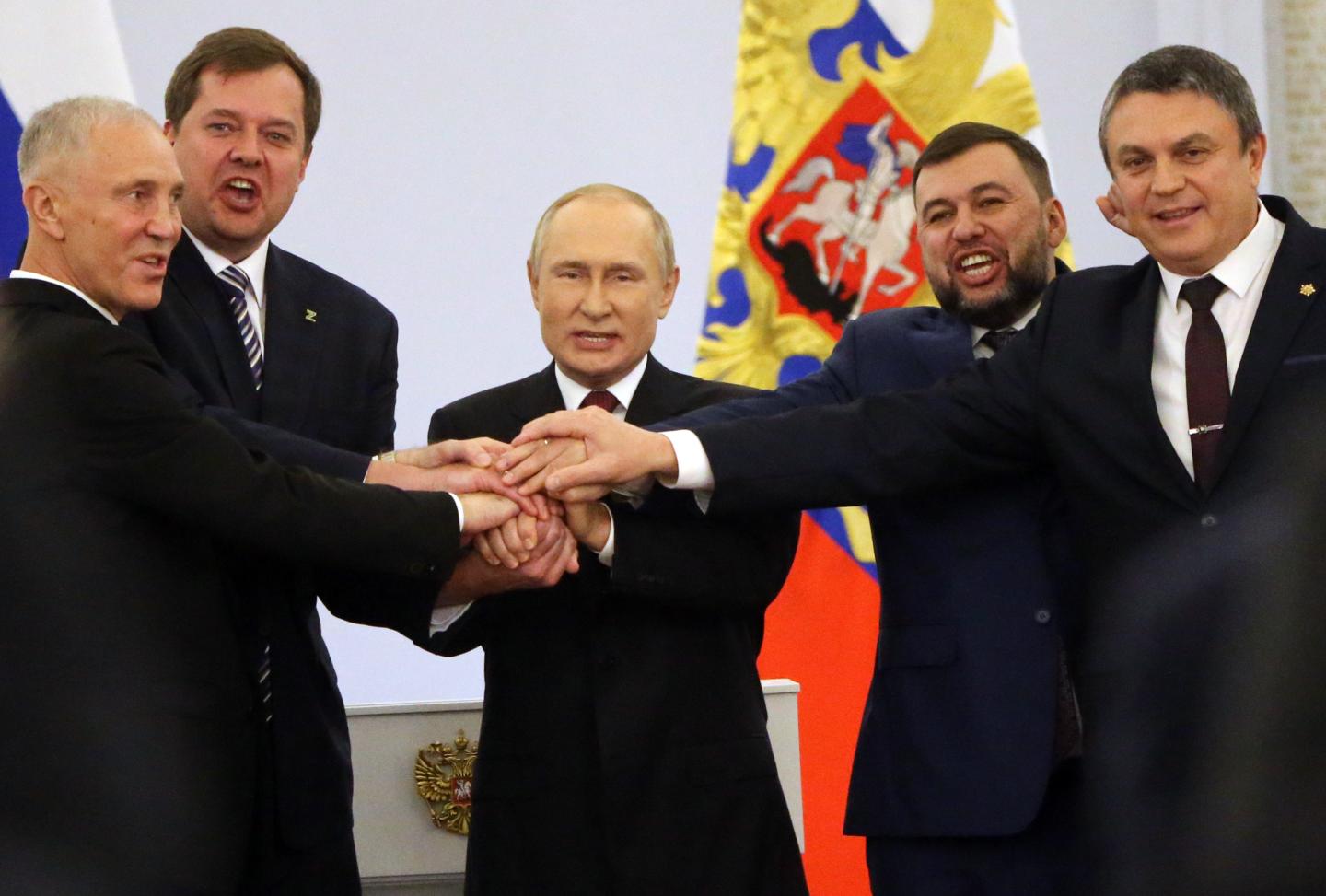 Russian President Vladimir Putin with Ukrainian separatist regional leaders Vladimir Saldo, Yevgeniy Balitsky, Leonid Pasechnik and Denis Pushilin.