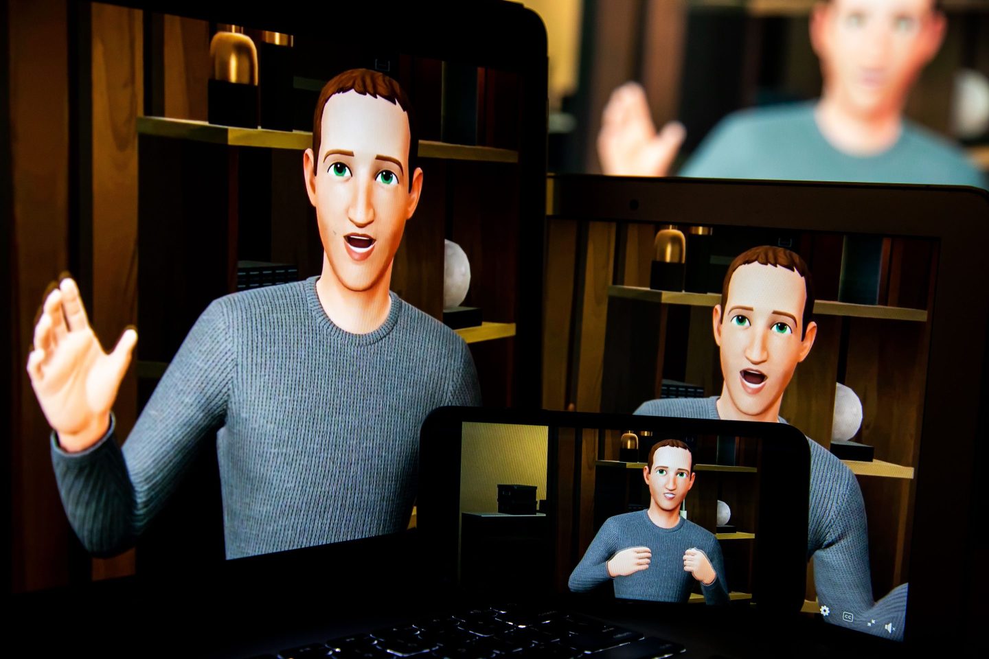 A digital version of Mark Zuckerberg on four displays