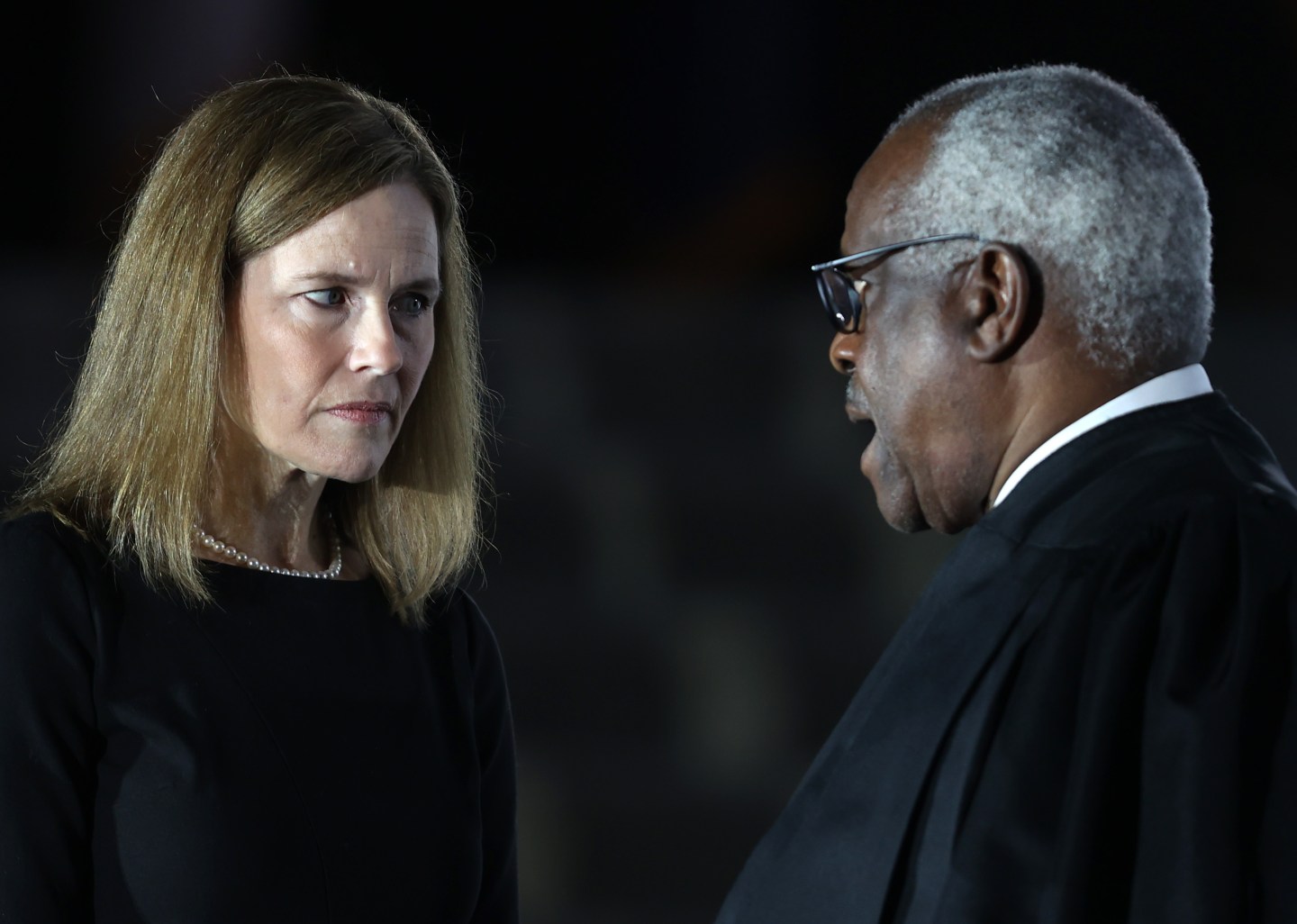 Supreme Court Justices Amy Coney Barrett and Clarence Thomas.