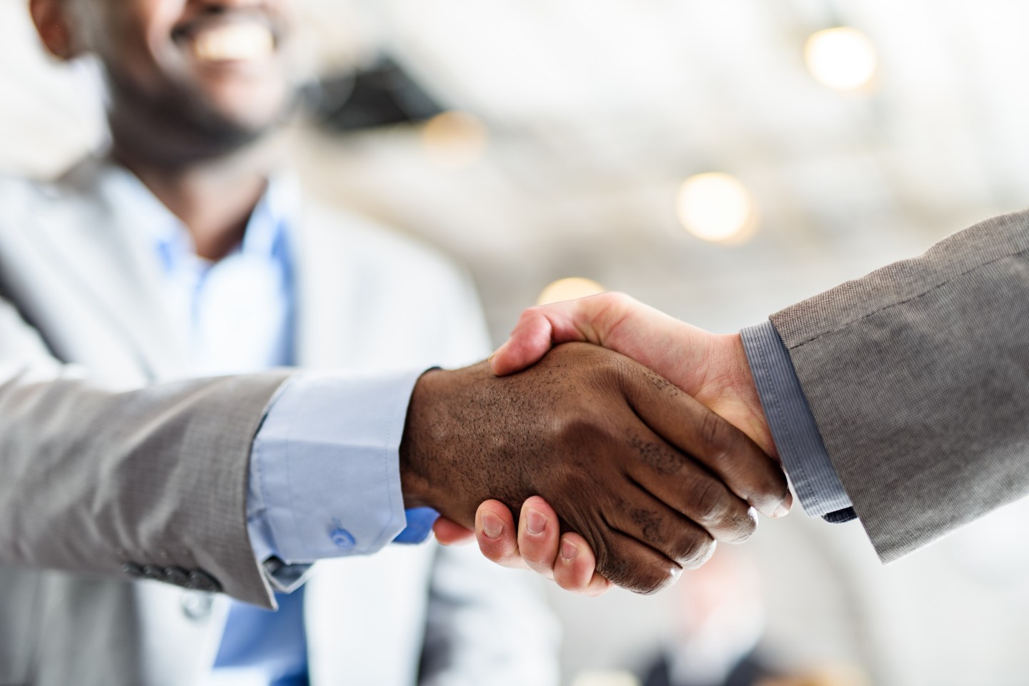 Two businesspeople shaking hands.