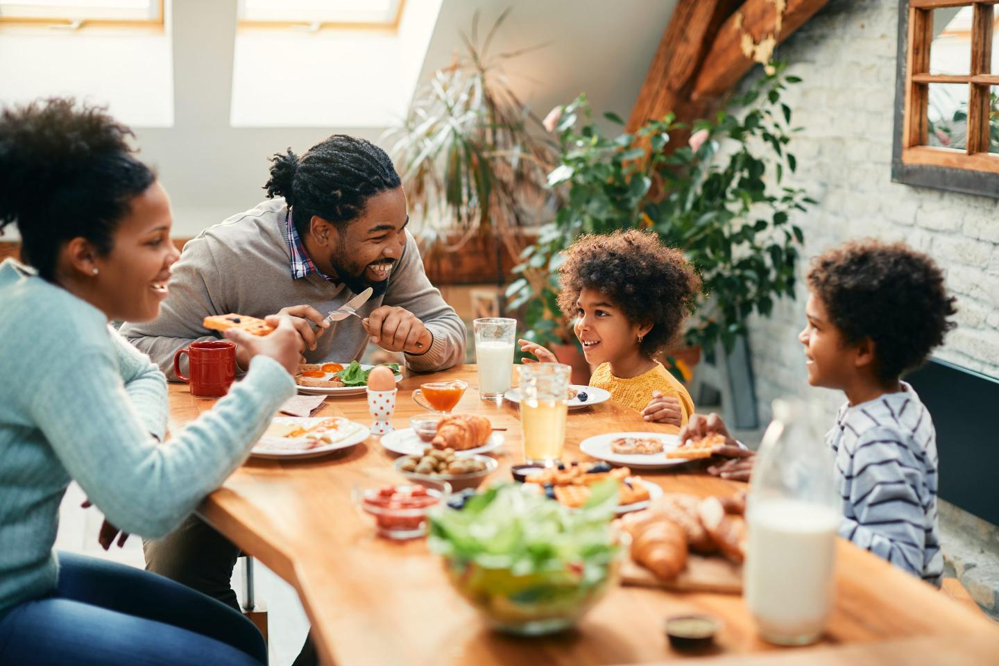 a family have a meal at home together
