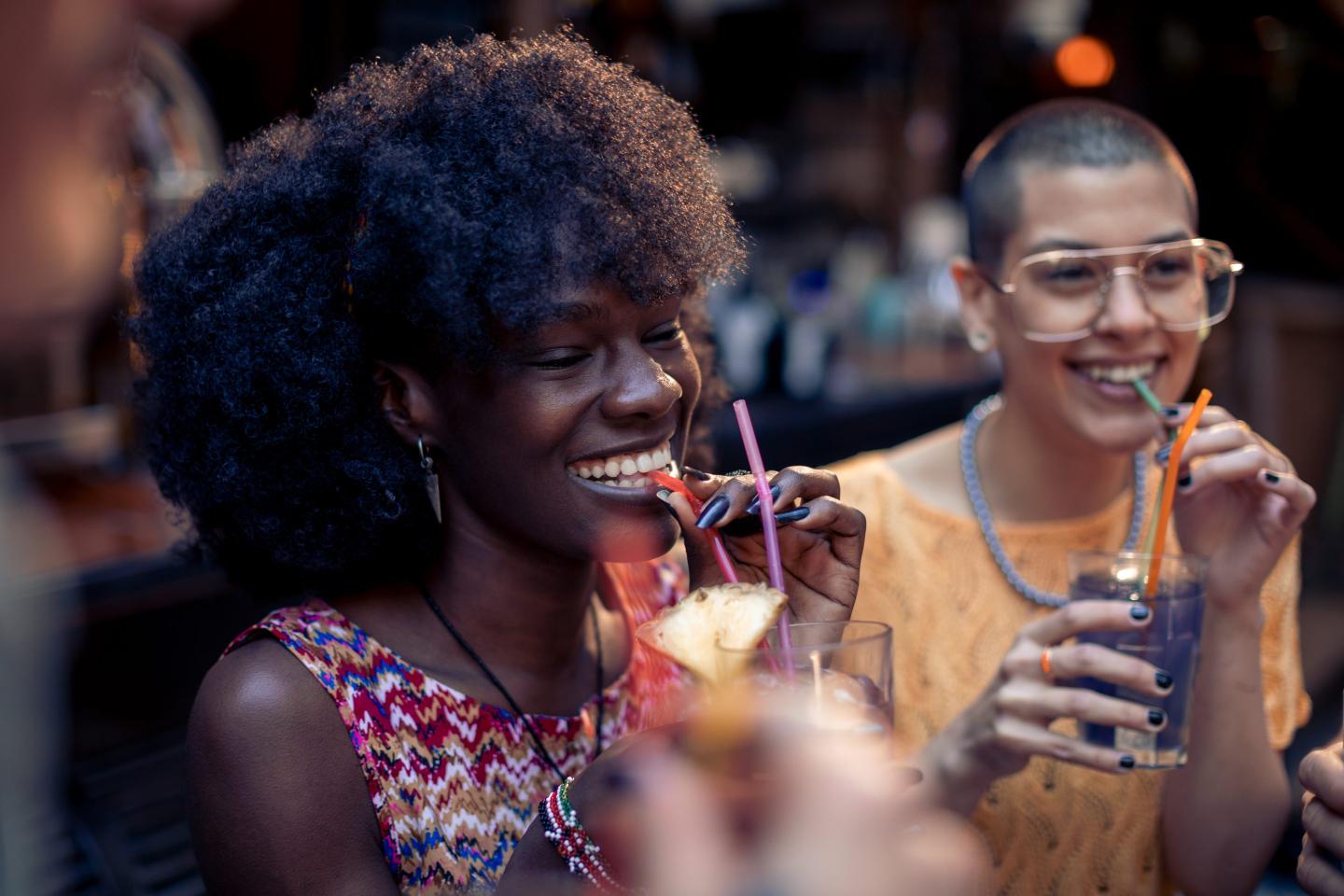 Friends drinking cocktails together