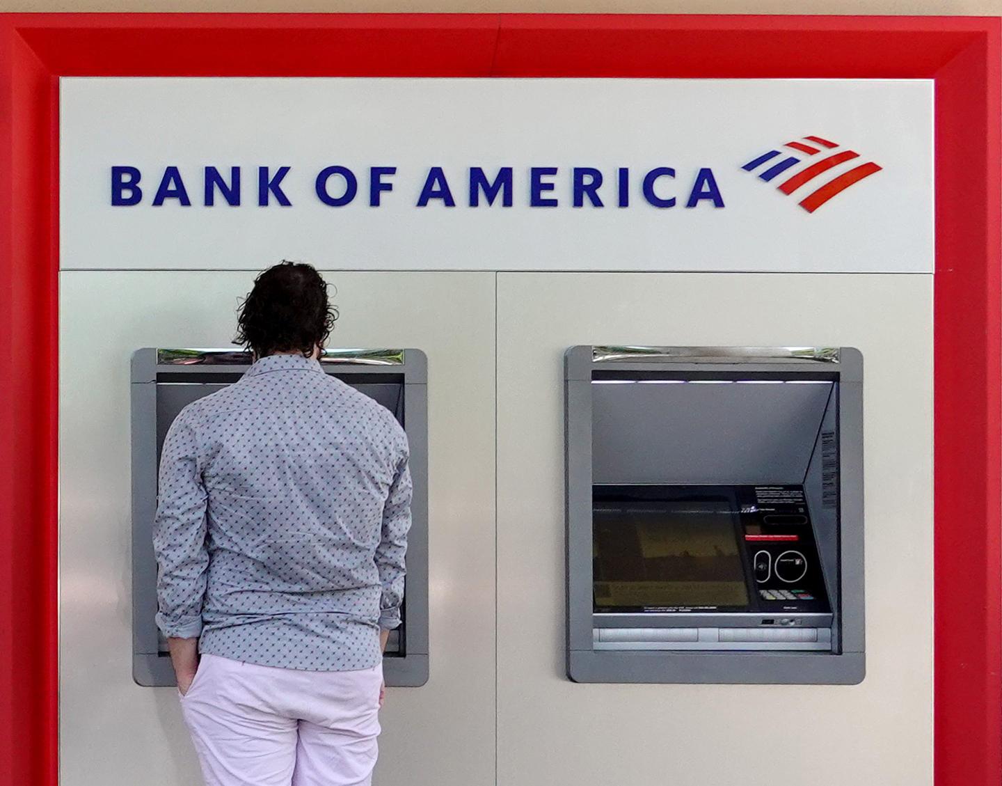 A customer uses an ATM in Miami