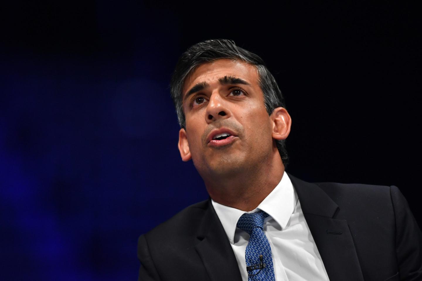 Rishi Sunak speaks on stage on August 23, 2022 in Birmingham, England