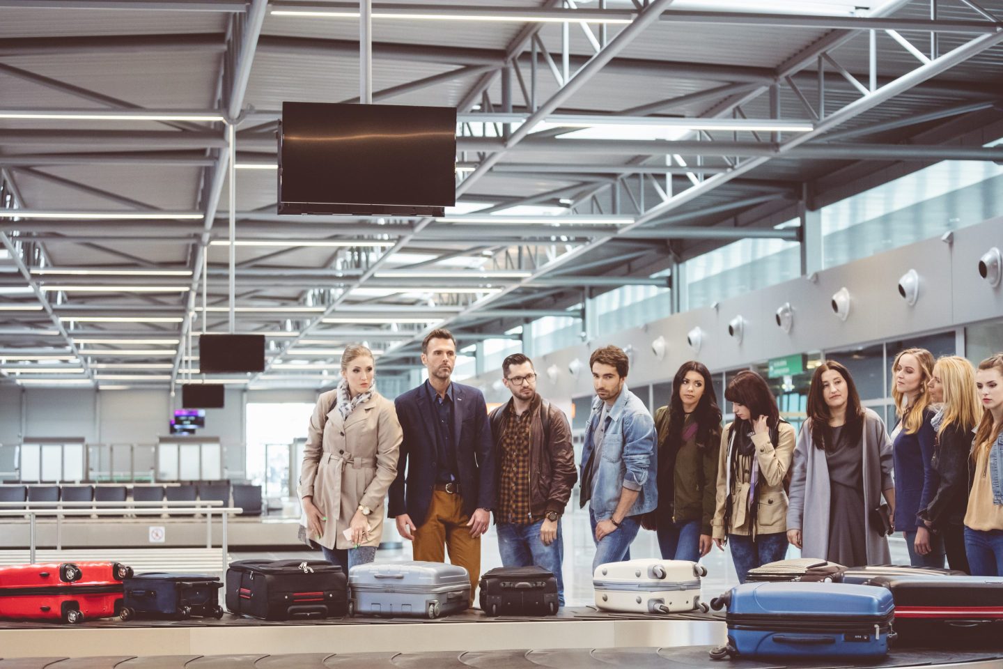 Travelers at baggage claim