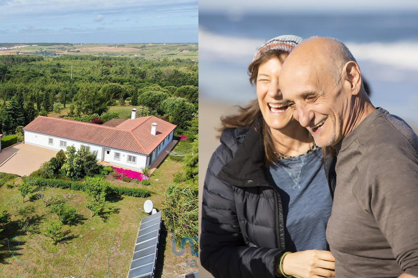 A home in Portugal next to a couple smiling