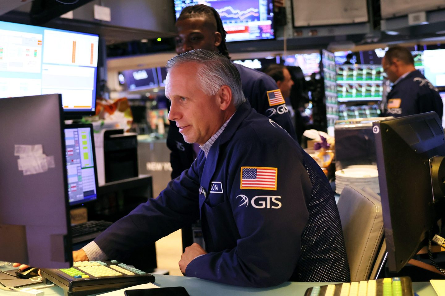 Traders work on the floor of the New York Stock Exchange during afternoon trading on September 13, 2022 in New York City.