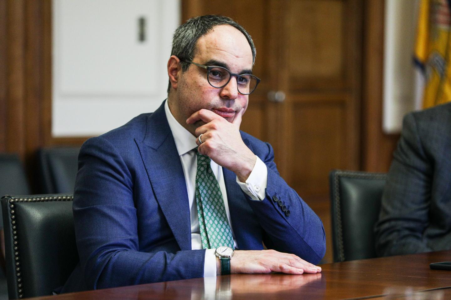 Jonathan Kanter, assistant attorney general of antitrust for the U.S. Department of Justice, sits at a conference table