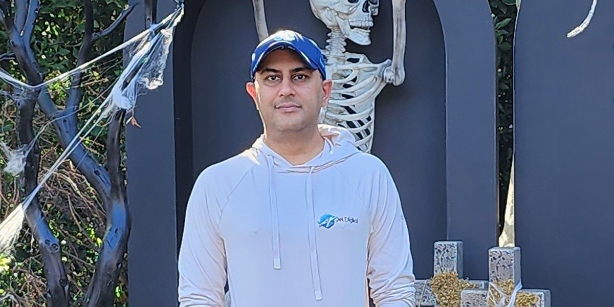 Ace Rogers standing in front of his Halloween display