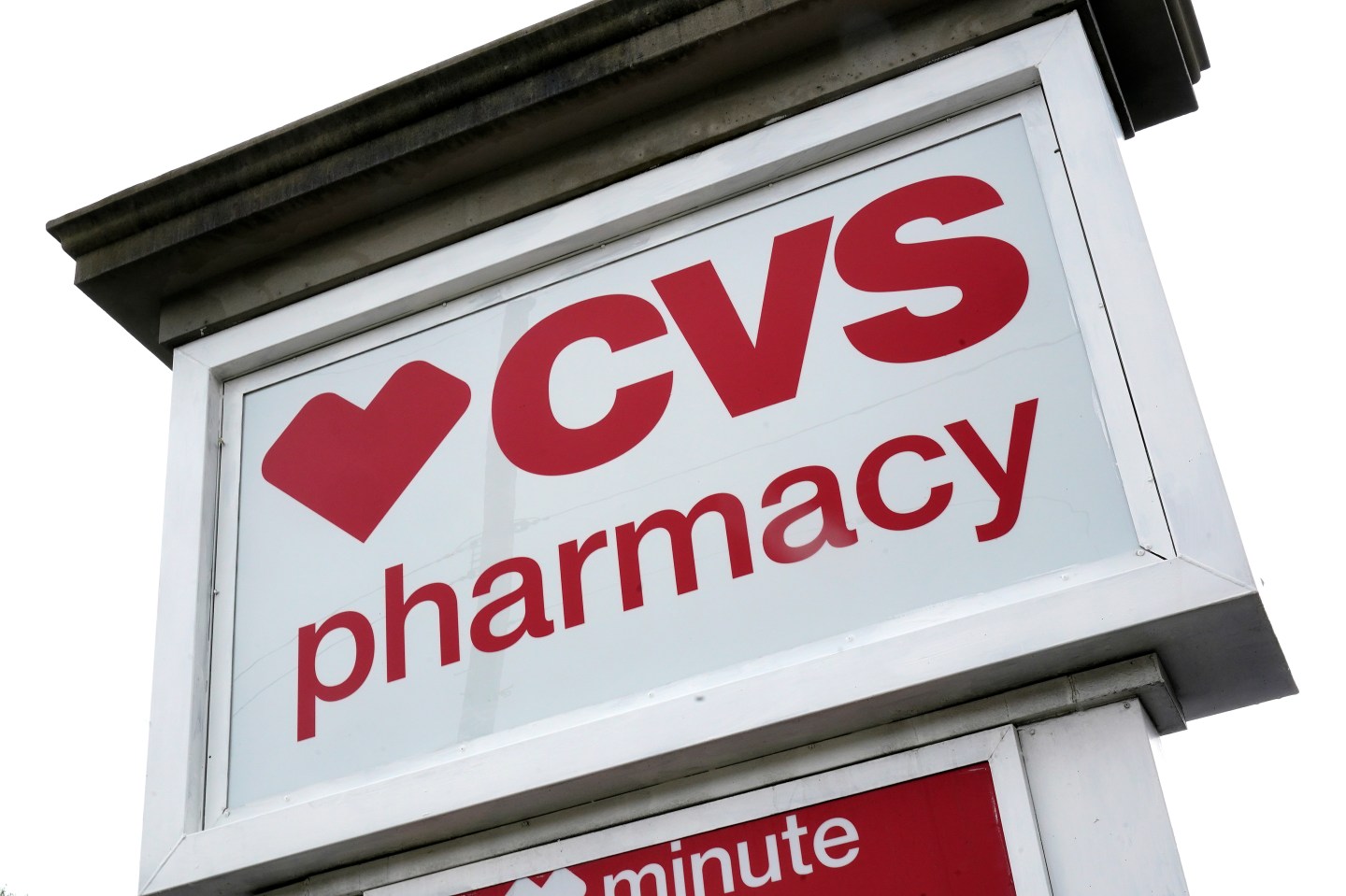A CVS Pharmacy is shown in Mount Lebanon, Pa., on Monday May 3, 2021. On Wednesday, Nov. 2, 2022, CVS Health said it has agreed to pay about $5 billion to state, local and Native American tribal governments to settle lawsuits over the toll of opioids. CVS is not admitting wrongdoing and the company would make the payments over a decade. (AP Photo/Gene J. Puskar)