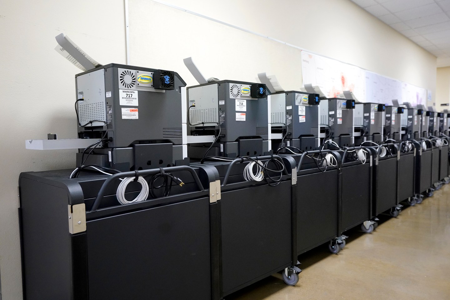 Affidavit printers are lined up at the Maricopa County Elections Department in Phoenix, Sept. 8, 2022.