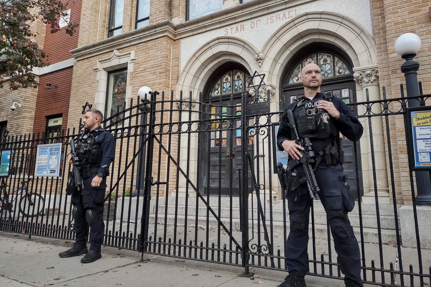 Police officers outside synagogue