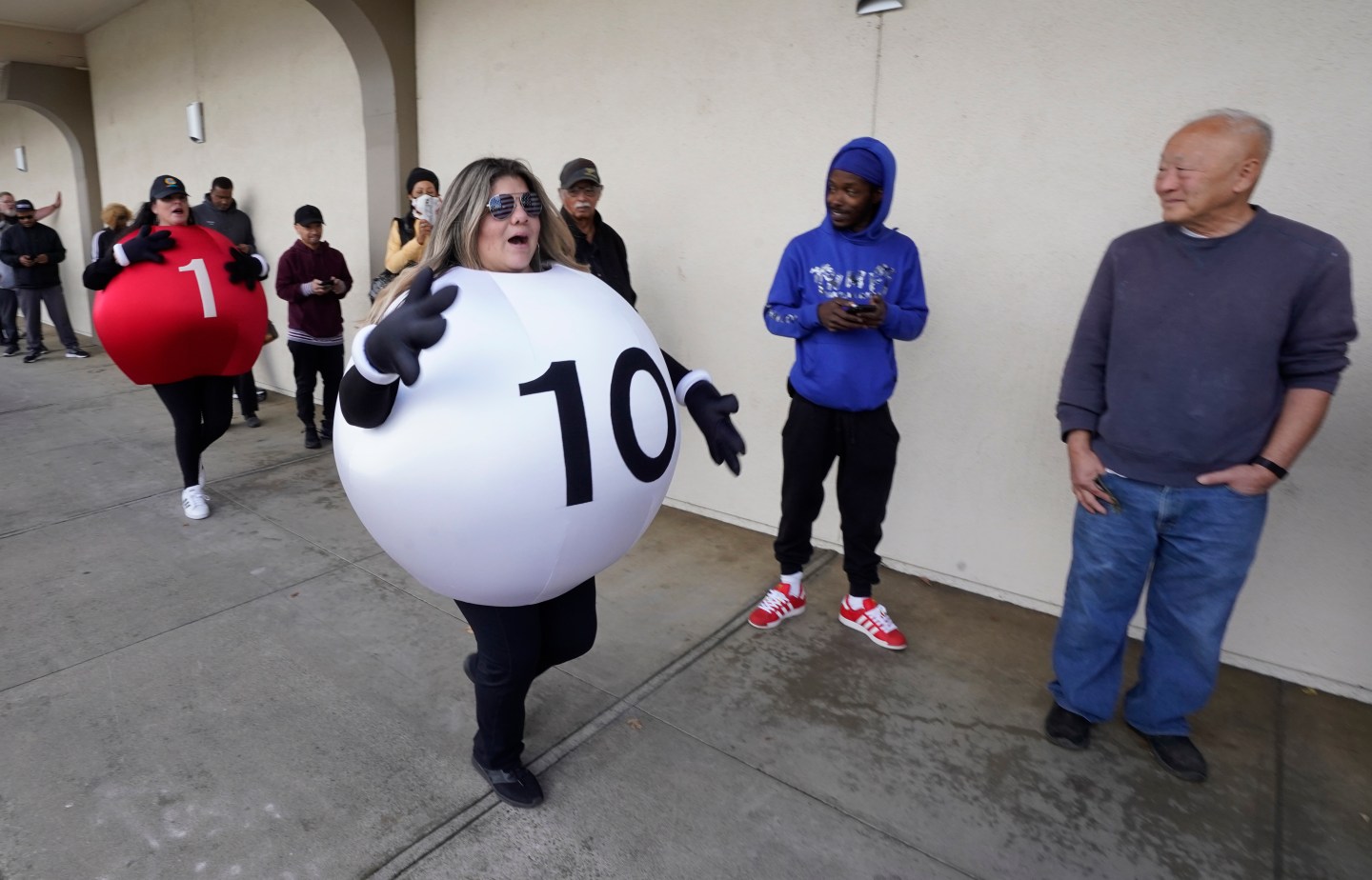 A woman dressed as a lottery ball.