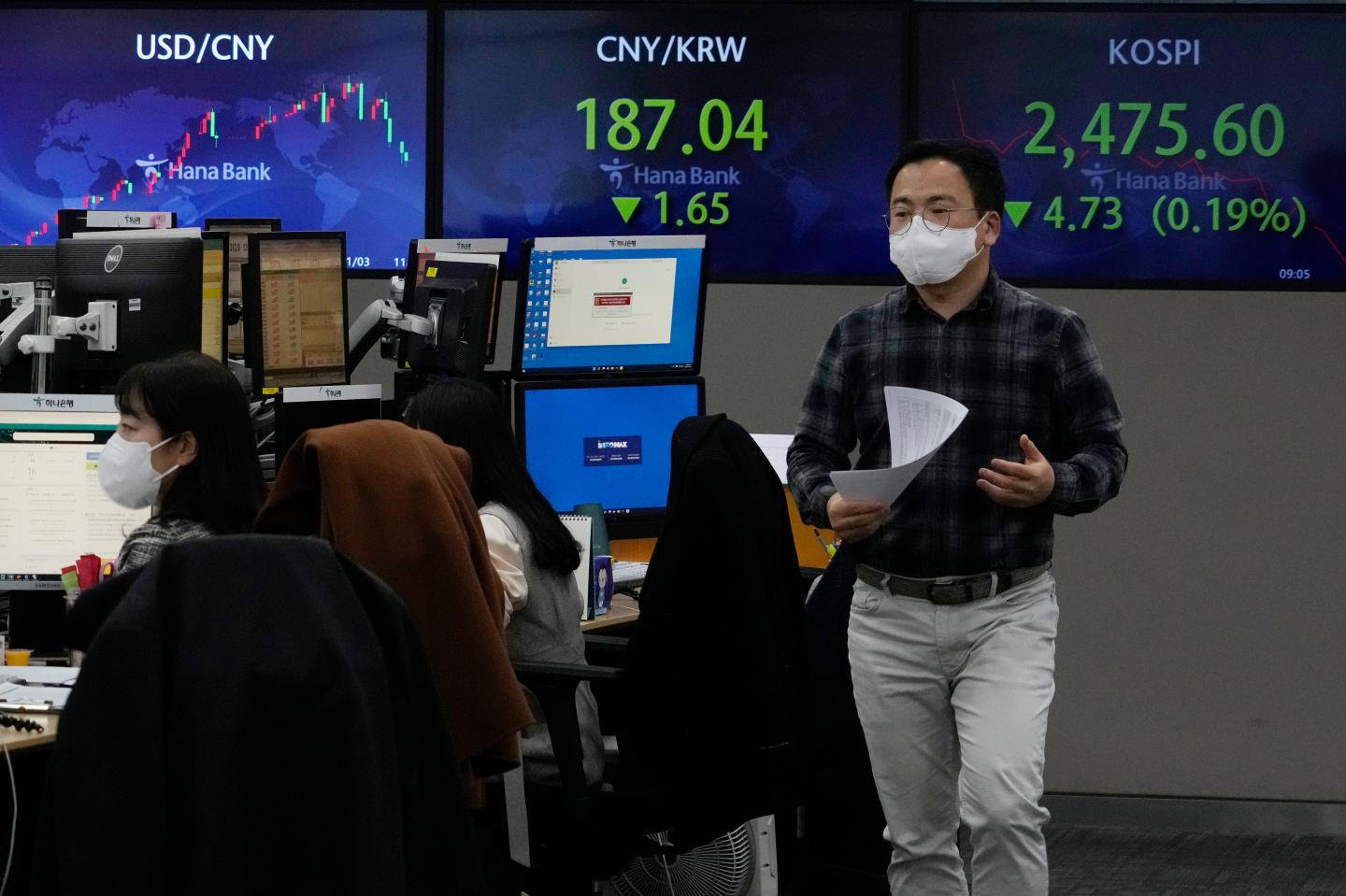 Investors jittery over Poland missile send Asian markets down and Europe up