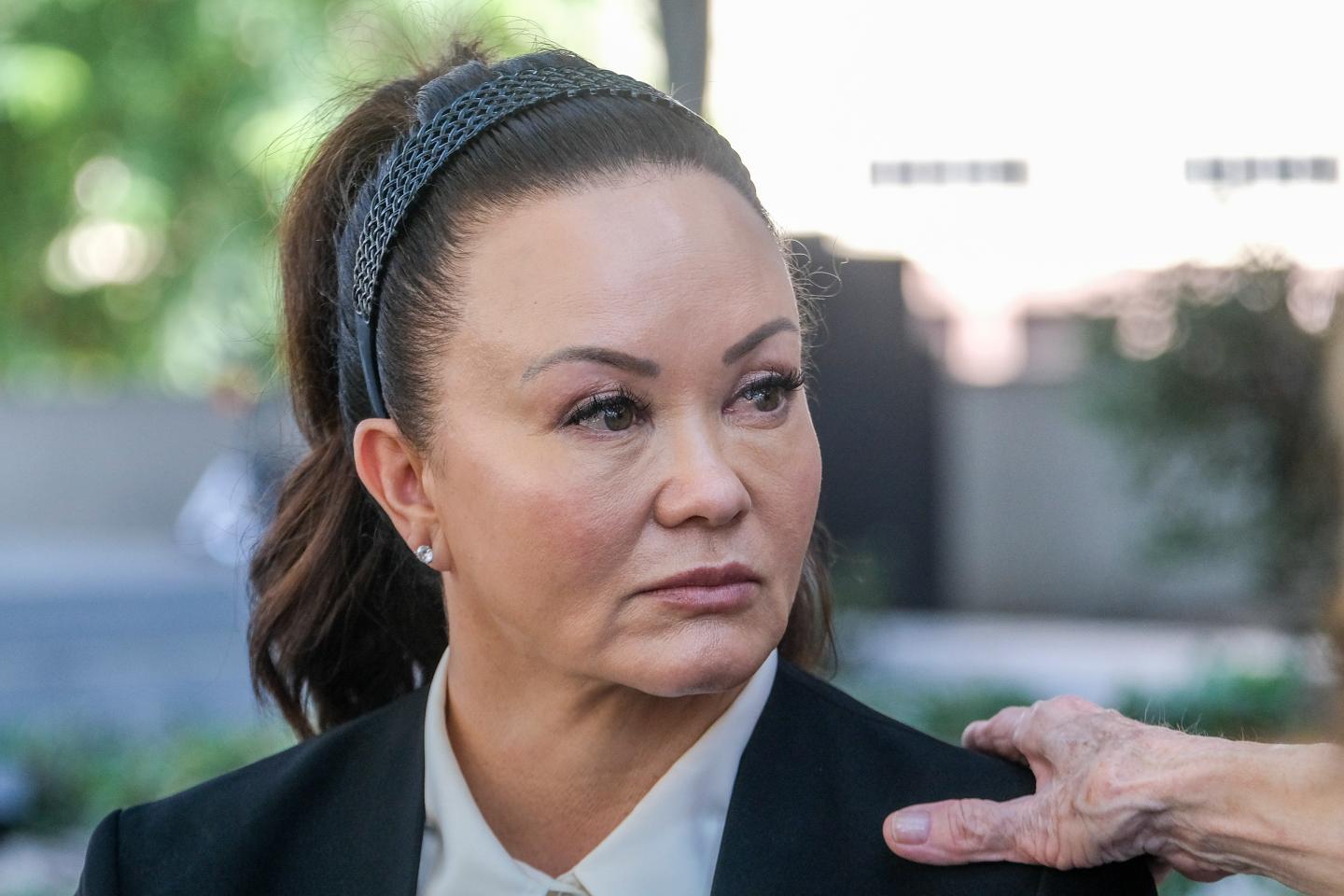 Alana Gee, the widow of a former University of Southern California football player suing the NCAA.