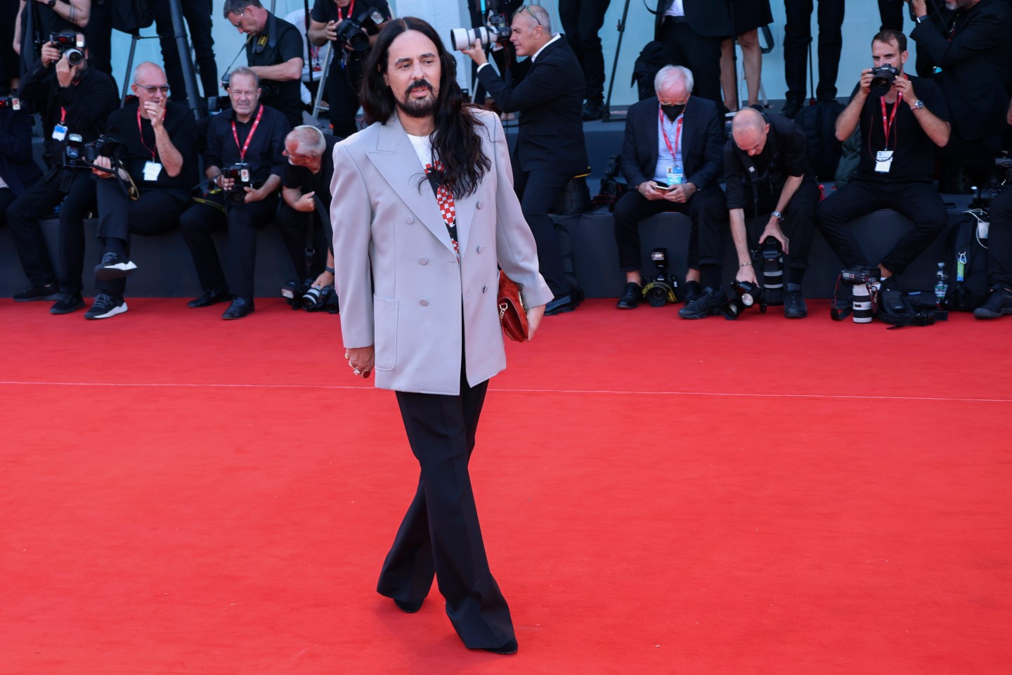 Alessandro Michele poses for photographers upon arrival at the premiere of the film 'Don't Worry Darling' during the 79th edition of the Venice Film Festival in Venice, Italy, Sept. 5, 2022.
