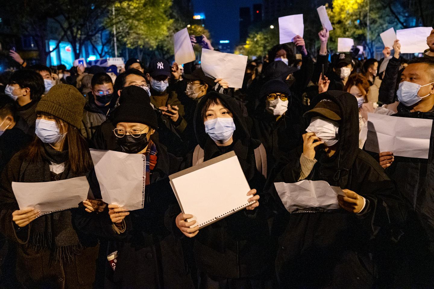 Protesters in China holding a blank piece of paper.