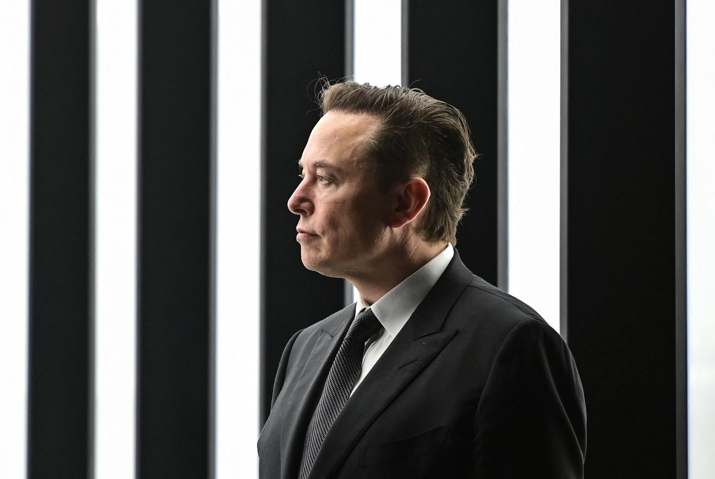 Tesla CEO Elon Musk is pictured as he attends the start of the production at Tesla's "Gigafactory" on March 22, 2022 .