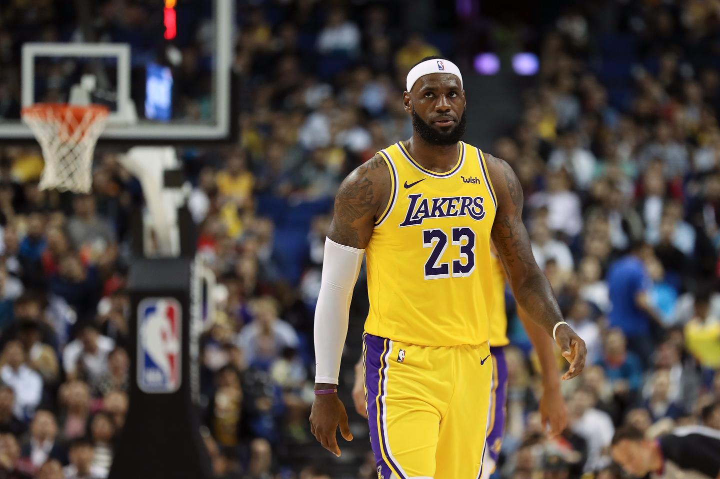 LeBron James #23 of the Los Angeles Lakers reacts during a preseason game against the Brooklyn Nets as part of 2019 NBA Global Games China at Mercedes-Benz Arena.