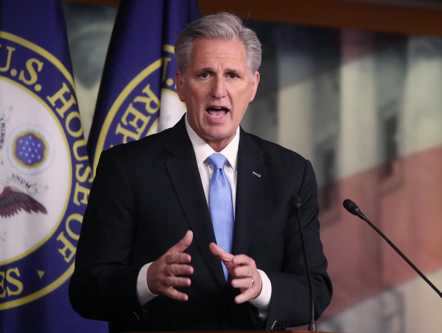 Republicans win a slim House majority, splitting control of Congress and complicating the agendas of both parties
