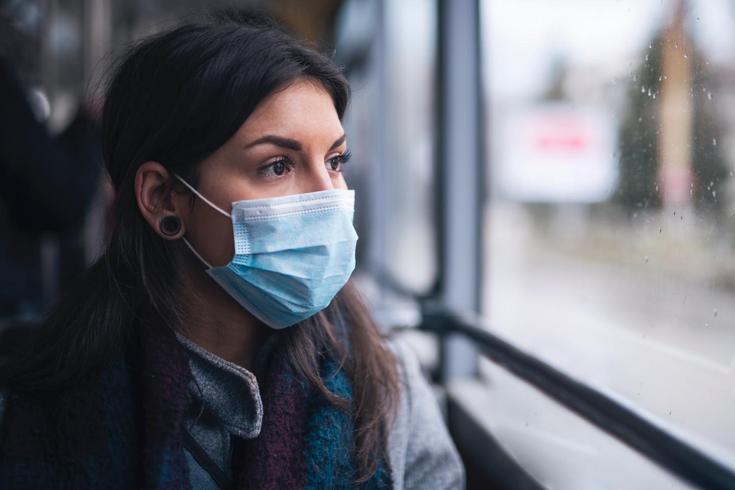 Woman wearing a protective face mask