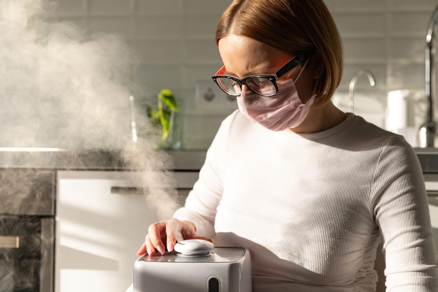 Woman with humidifier