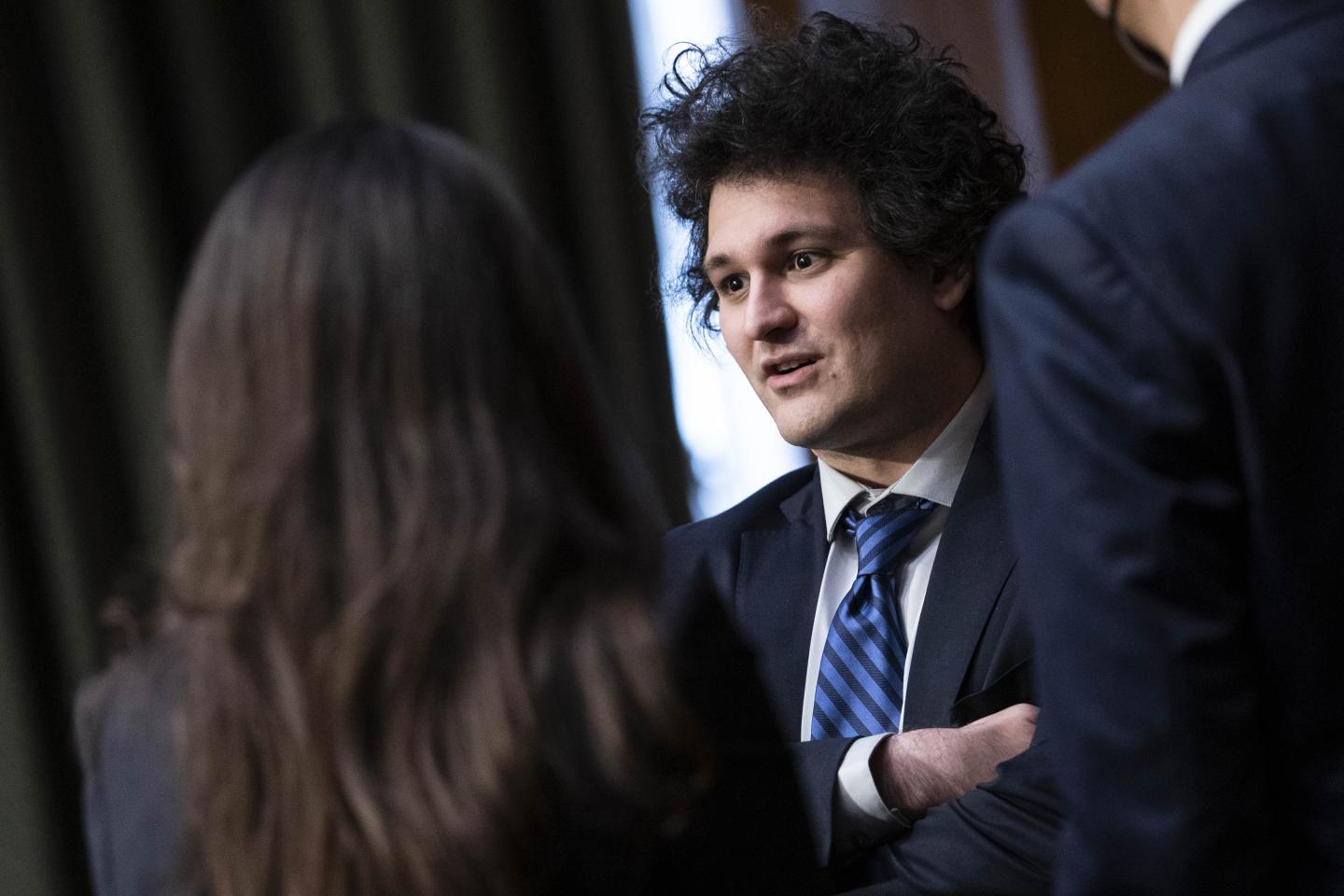 FTX CEO Sam Bankman-Fried speaks with senators and their staff on Feb. 9 in Washington, D.C.