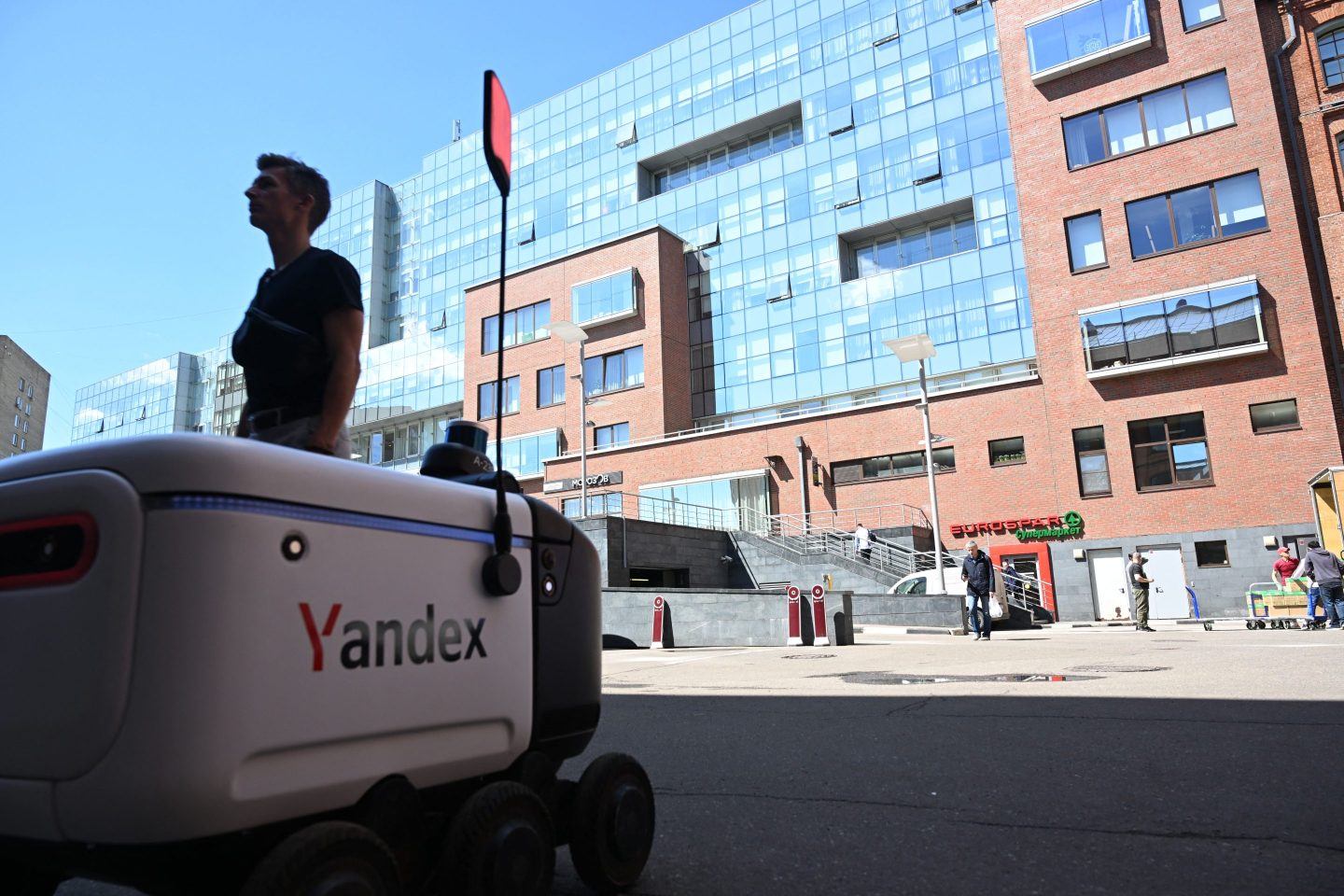 A Yandex delivery robot in front of Yandex's headquarters in Moscow