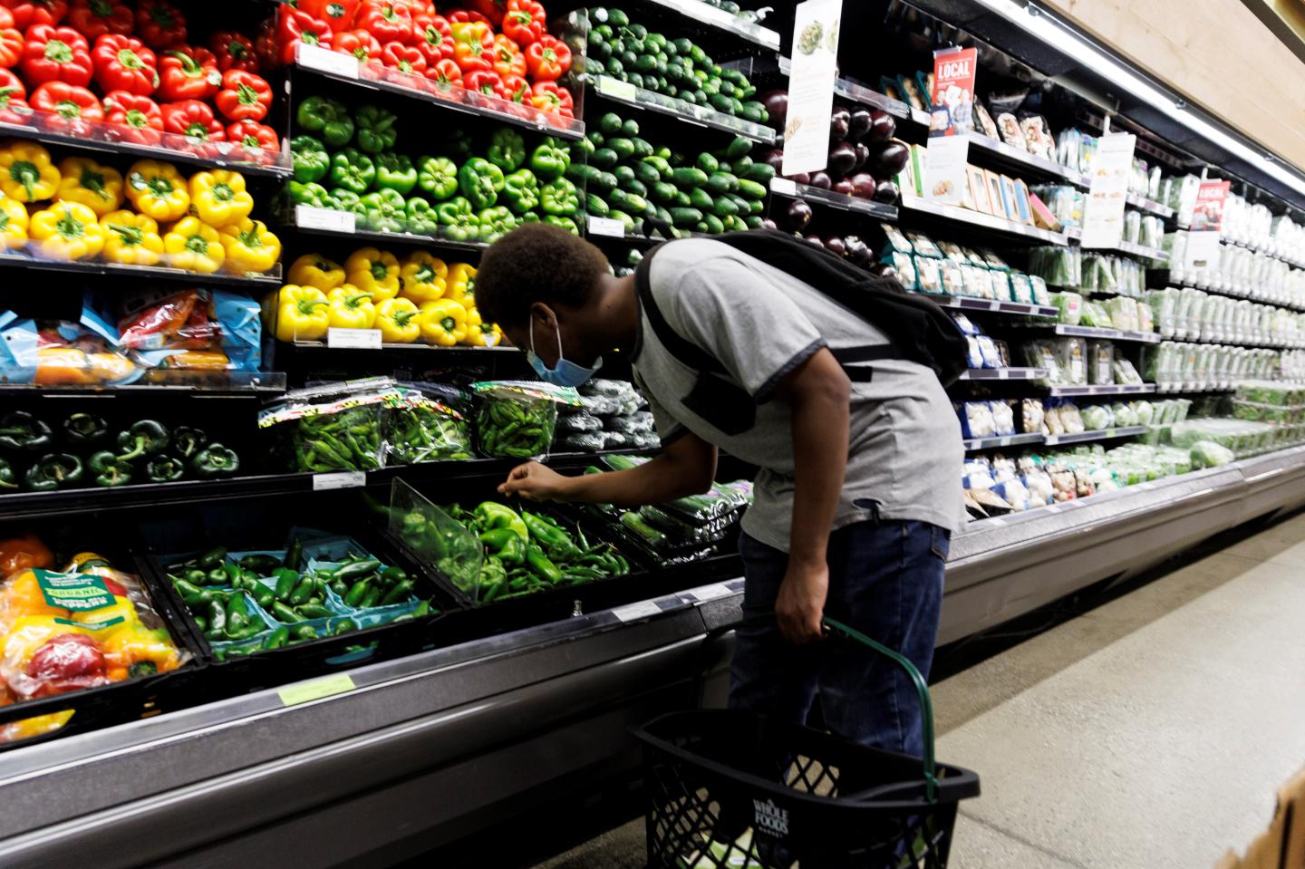 A shopper in a grocery store