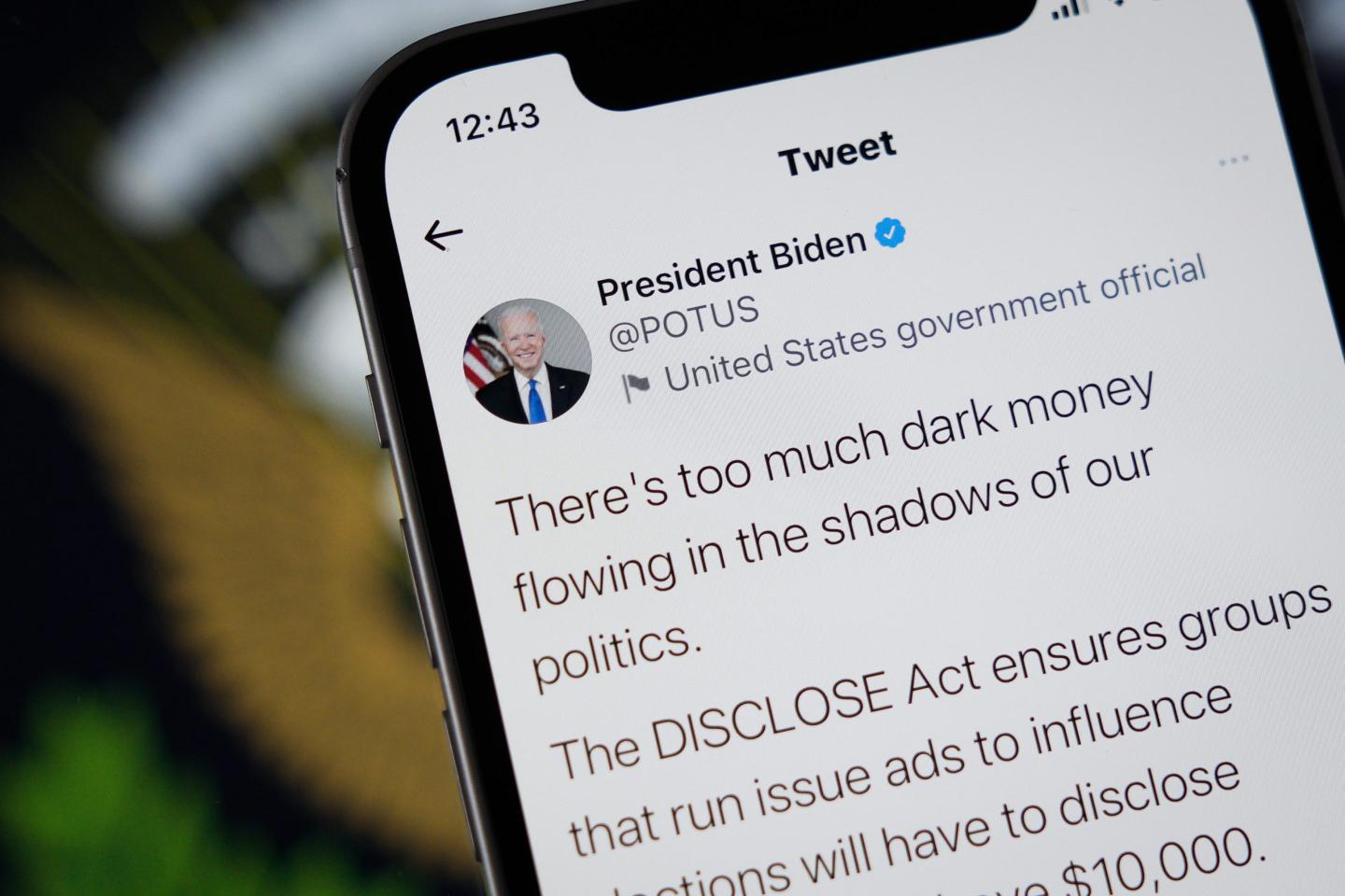 The Twitter profile belonging to the 46th US President Joe Biden on an Apple iPhone mobile phone
