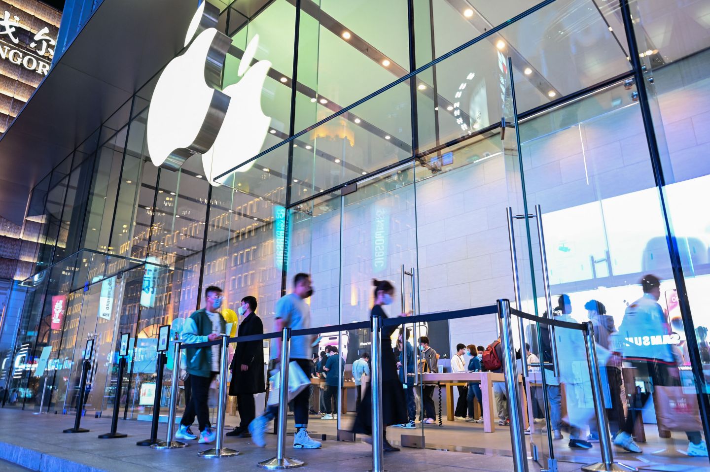 People visit an Apple store in Shanghai on Oct. 24, 2022.