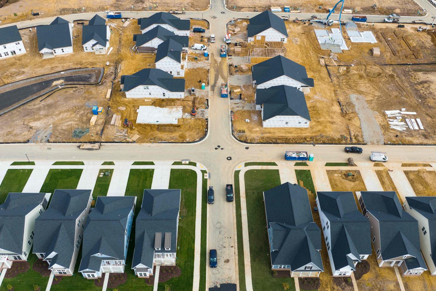 An aerial view of completed and under construction new homes at a site in Trappe, Maryland, on Oct. 28. New home sales in the U.S. dipped in September, as worsening affordability nudges ownership further out of reach for many.