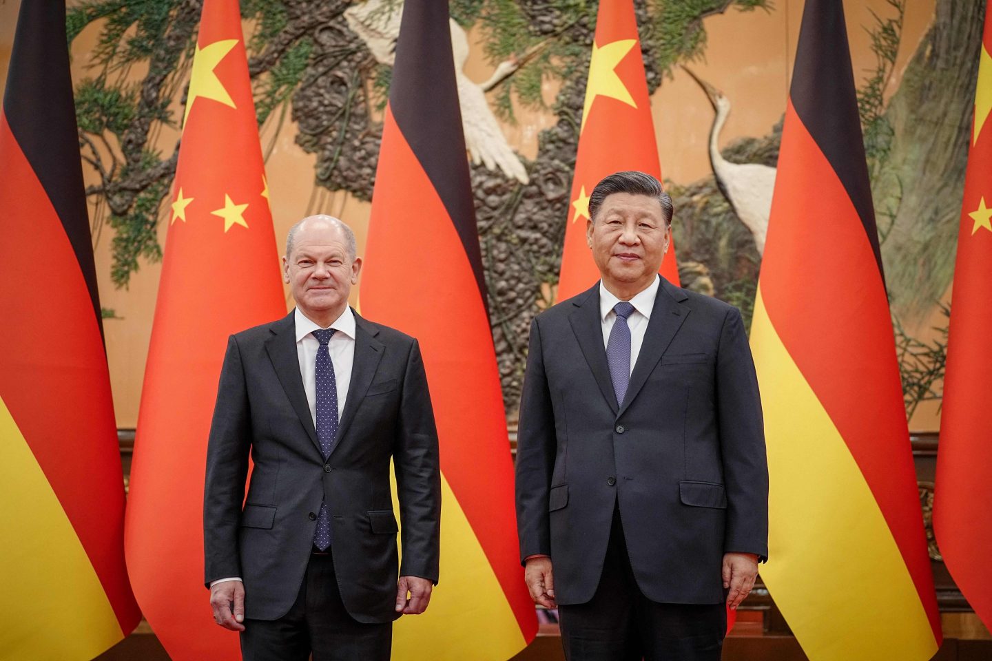 Chinese President Xi Jinping welcomes German Chancelor Olaf Scholz at the Grand Hall in Beijing on Friday.