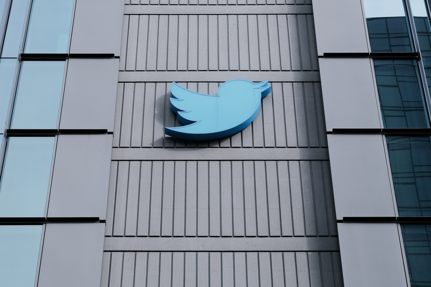 Twitter headquarters featuring the platform's bird logo on the building's facade.