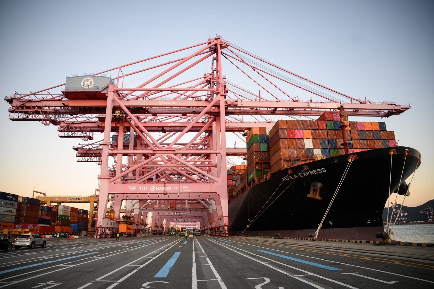 Containers are loaded from the container freighter "Alula Express" at Busan Newport International Terminal, one of the largest container ports in the world.