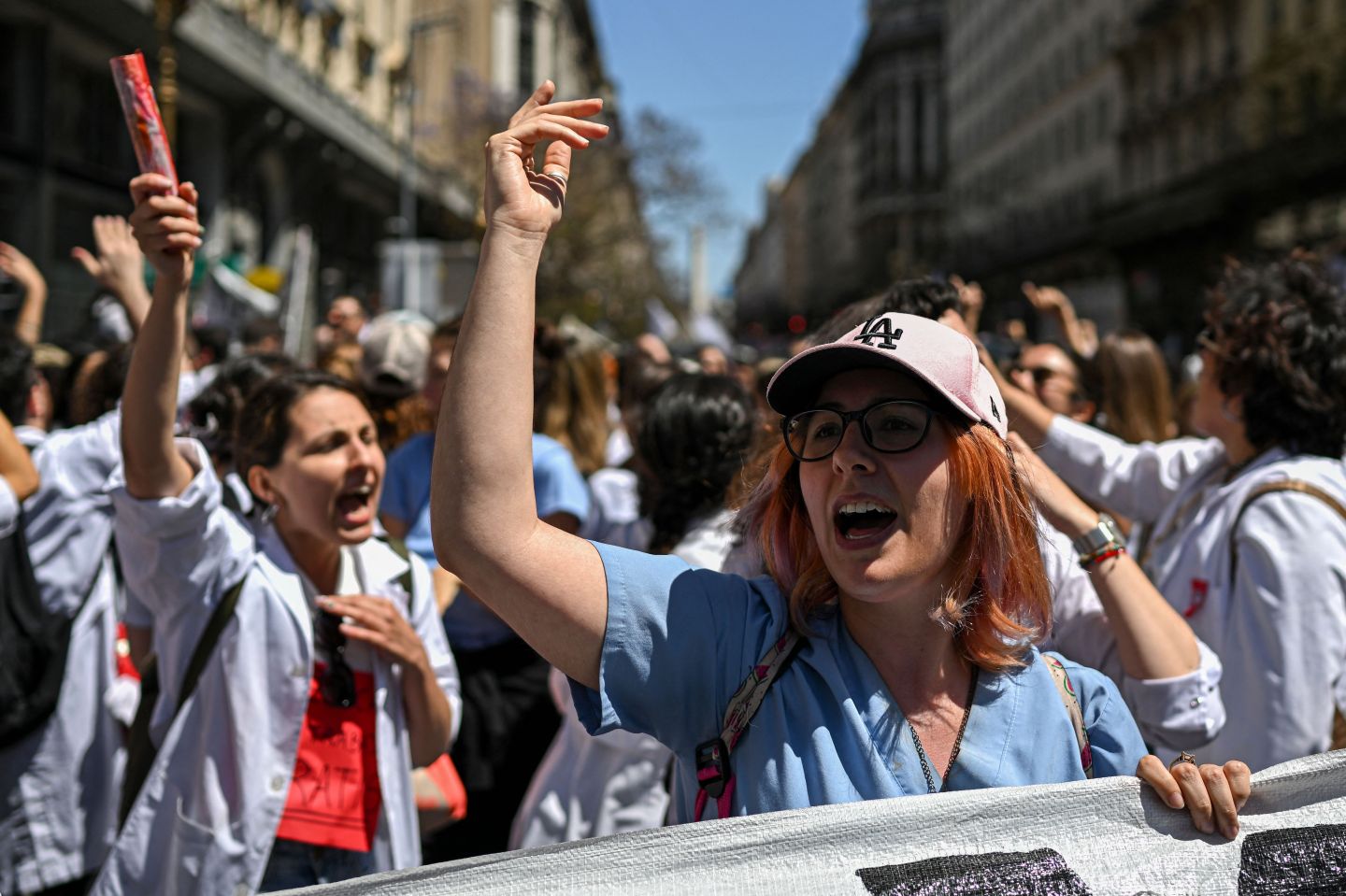 Health workers in Argentina protesting in the street.