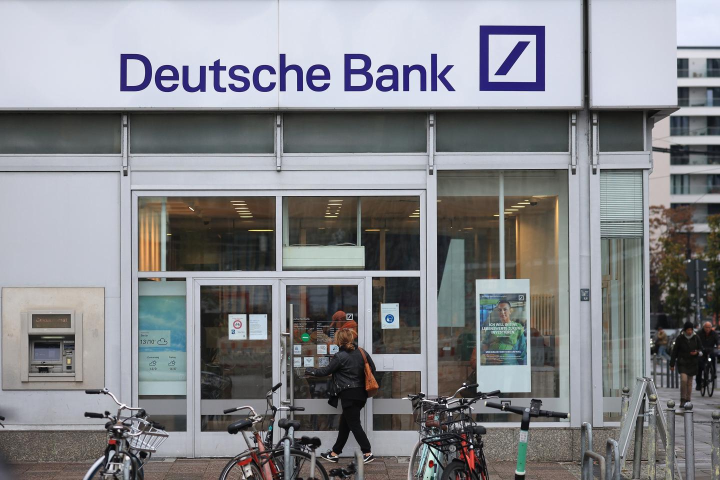 Someone walks into a Deutsche Bank in Germany.