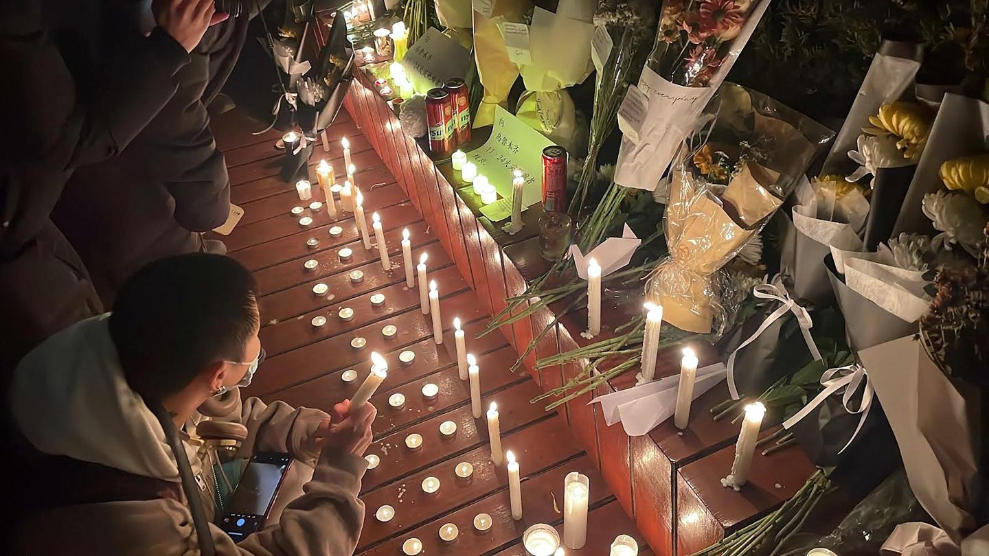 Chinese commemorated lives lost in a deadly apartment fire in Ürümqi, in China's Xinjiang region. The gathering at times escalated into broader protests against COVID-zero restrictions.