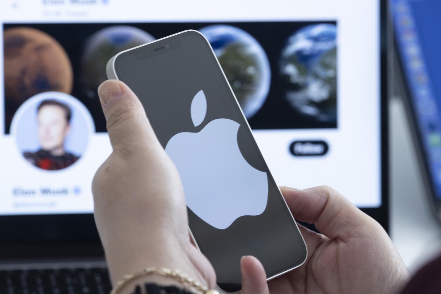 The Apple logo on a phone screen