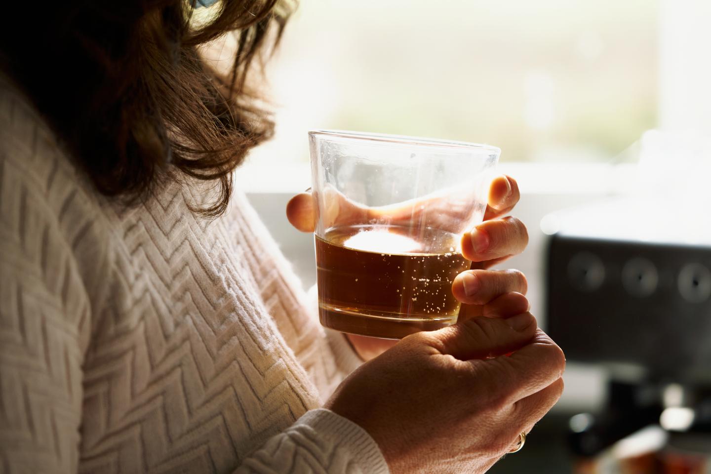 Woman holding drink