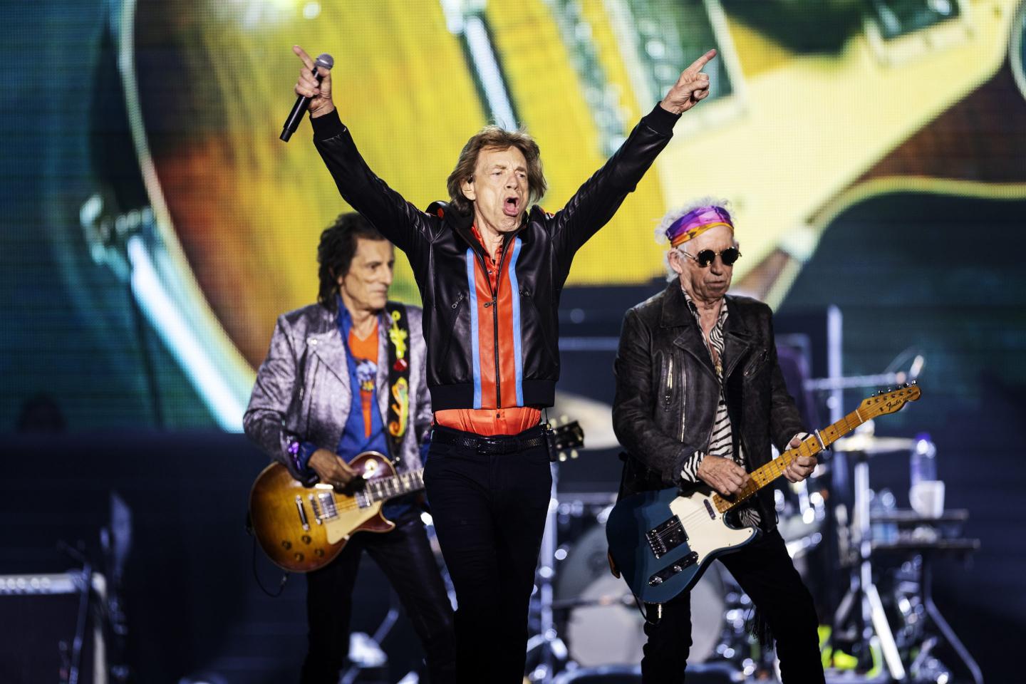 Ron Wood, Mick Jagger, and Keith Richards of the Rolling Stones on stage