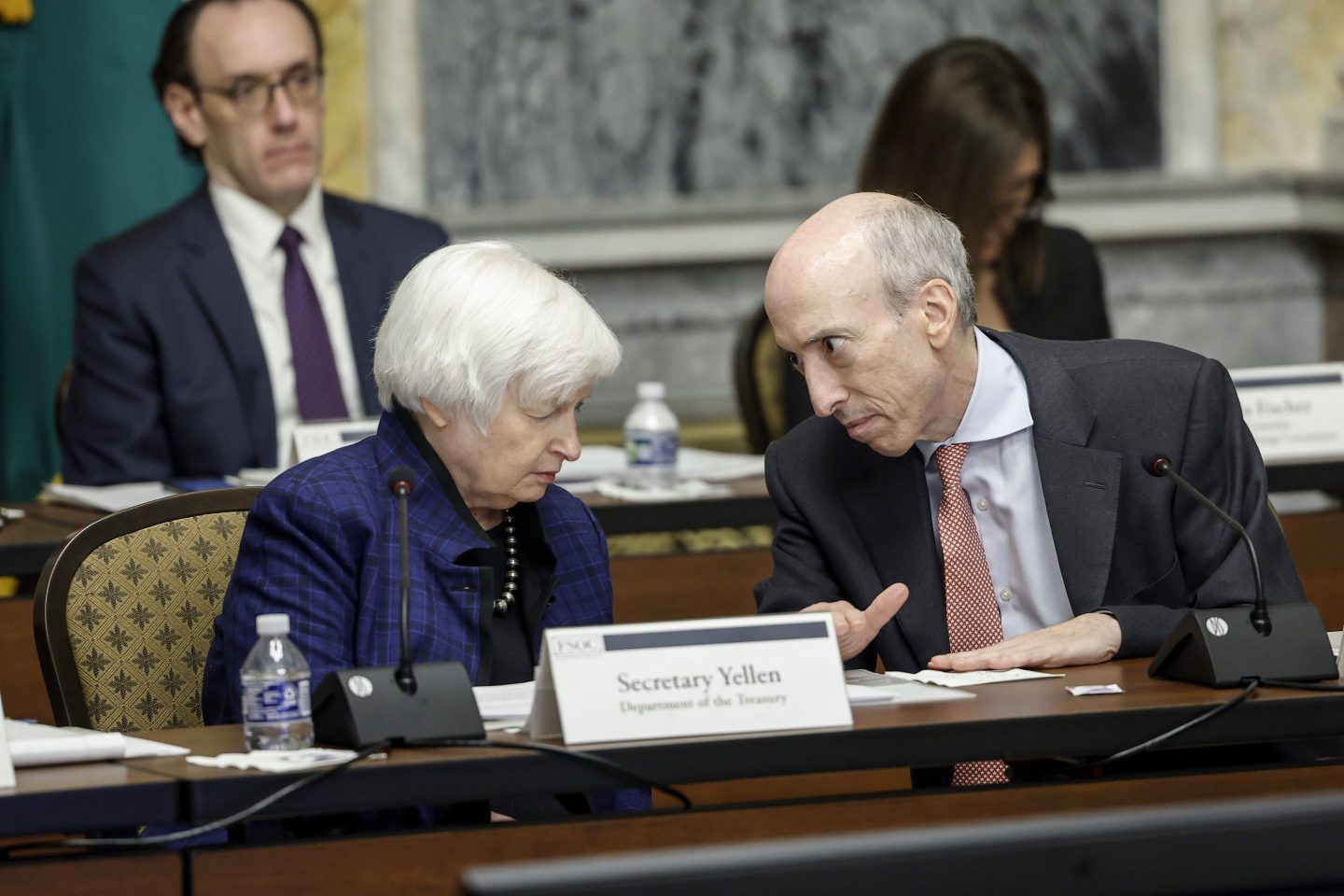 Treasury Secretary Janet Yellen speaks with Securities and Exchange Commission Chair Gary Gensler.