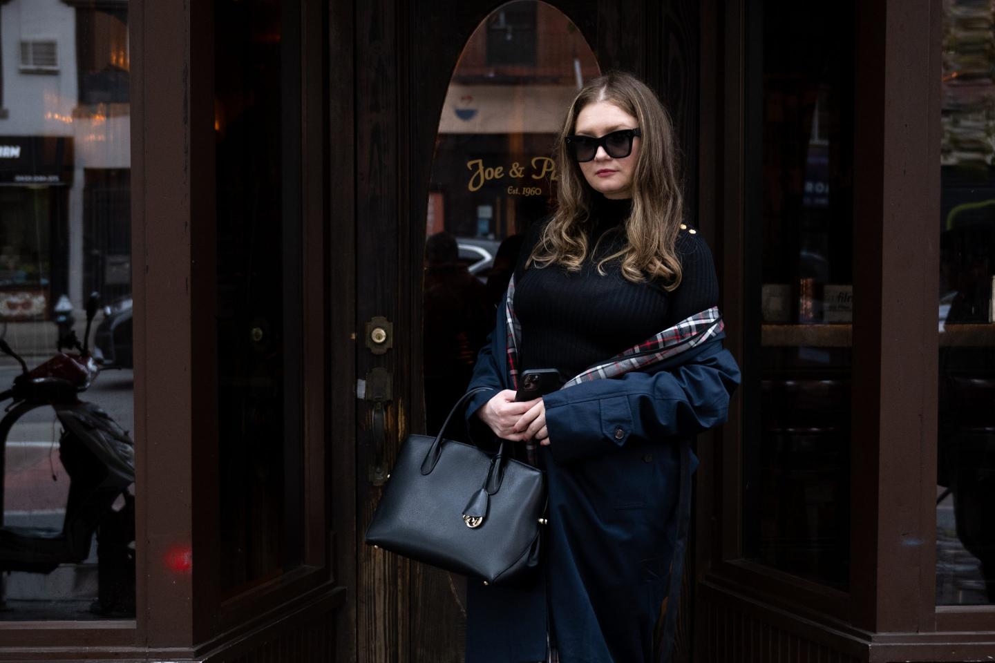 Anna Sorokin out front of her apartment