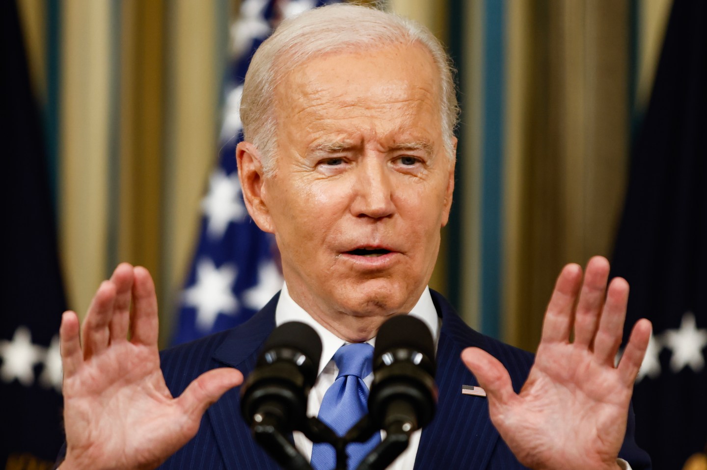 U.S. President Joe Biden takes questions from reporters, after he delivered remarks in the State Dining Room, at the White House on November 09, 2022 in Washington, DC.