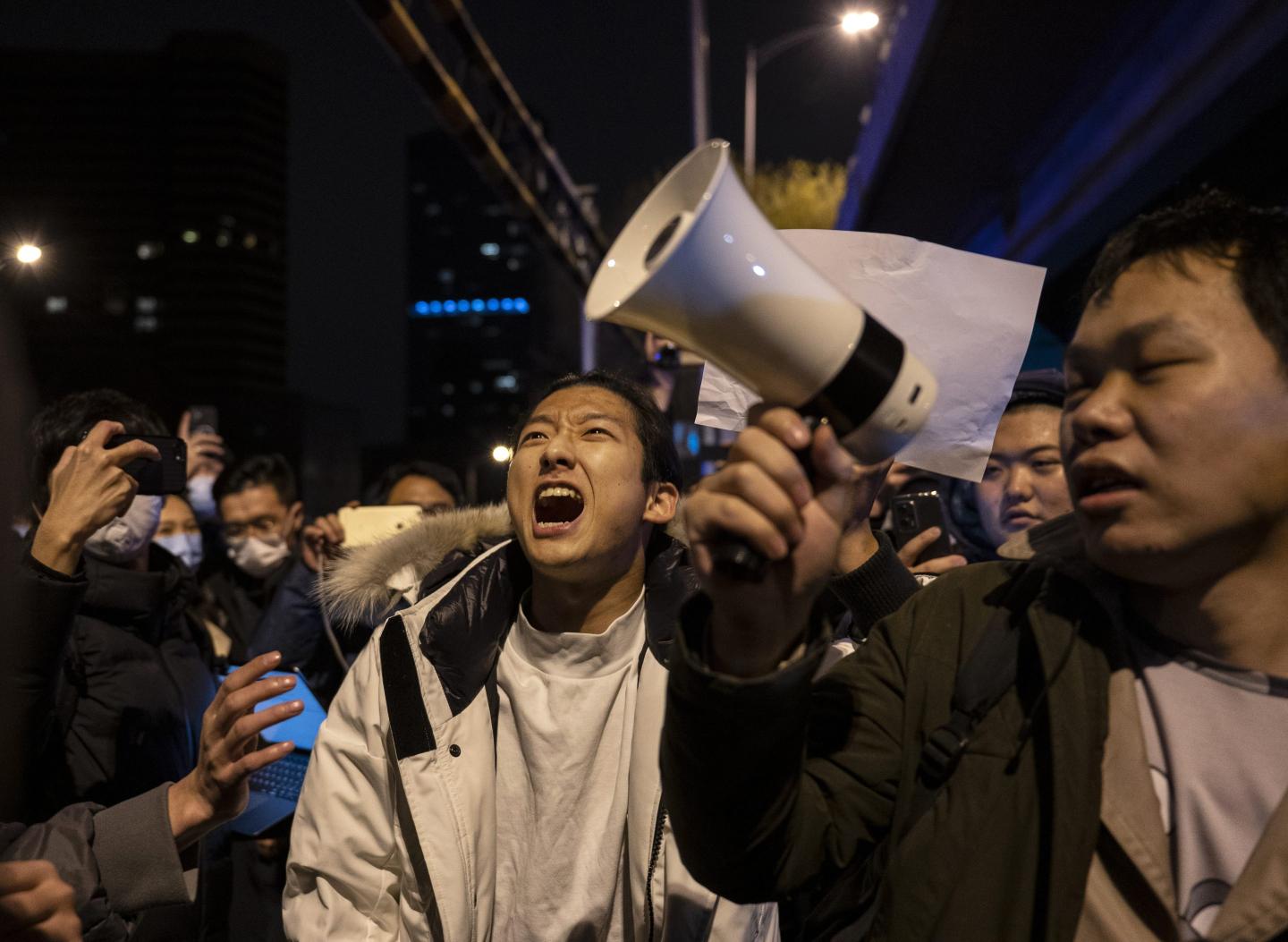 China’s rare public rebellion  against zero-COVID lockdowns sends markets tumbling