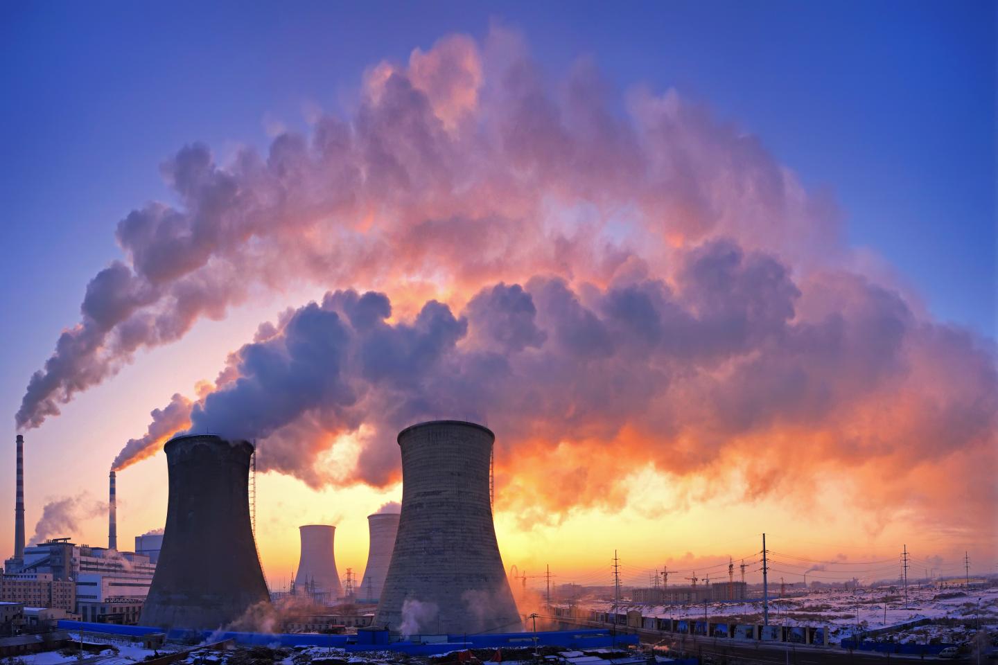 Chimneys at a Chinese power plant churn huge amounts of smoke into the sky
