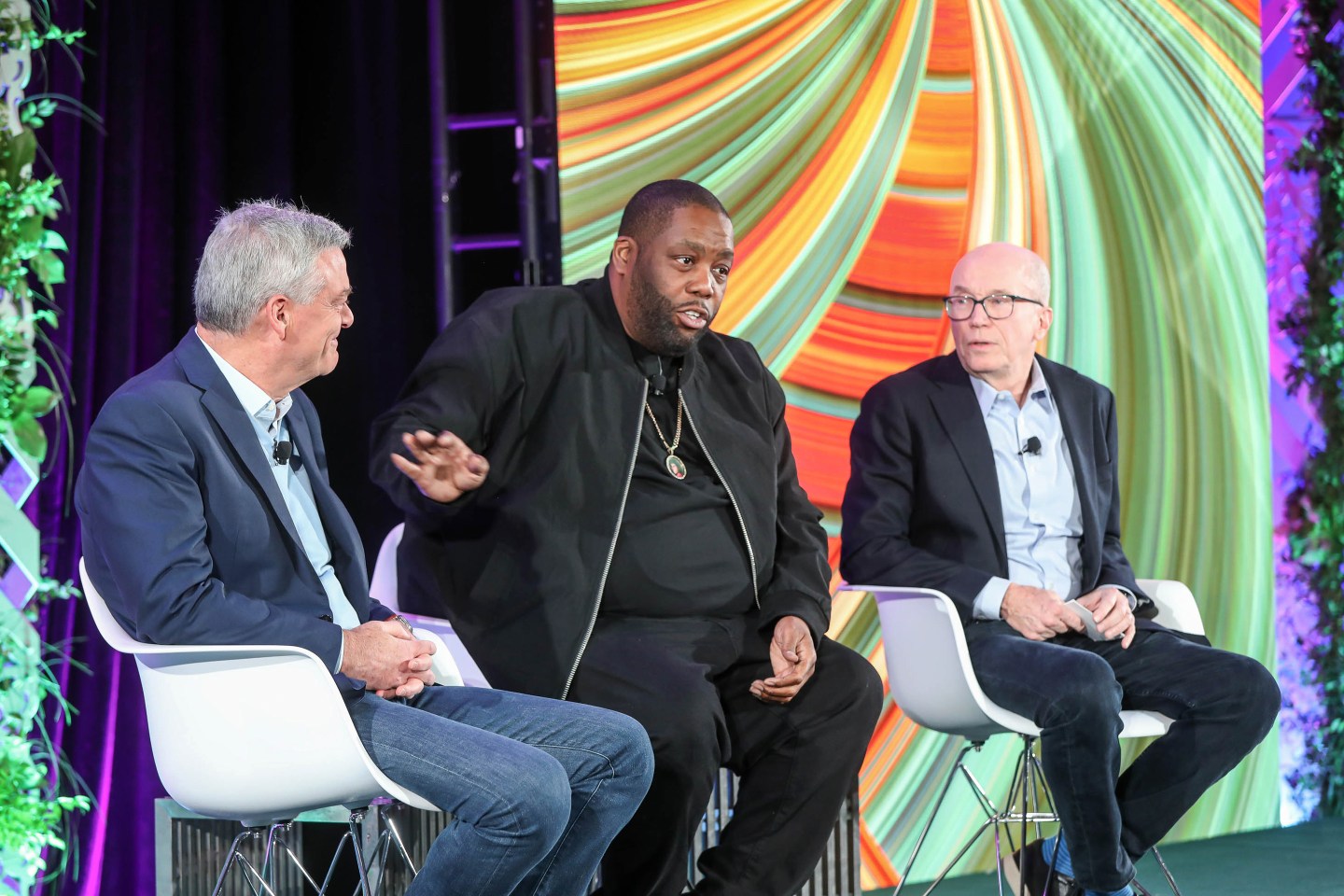 Tony Ressler and Killer Mike onstage with Fortune CEO Alan Murray at the Fortune Impact Initiative conference, Nov. 29, 2022.