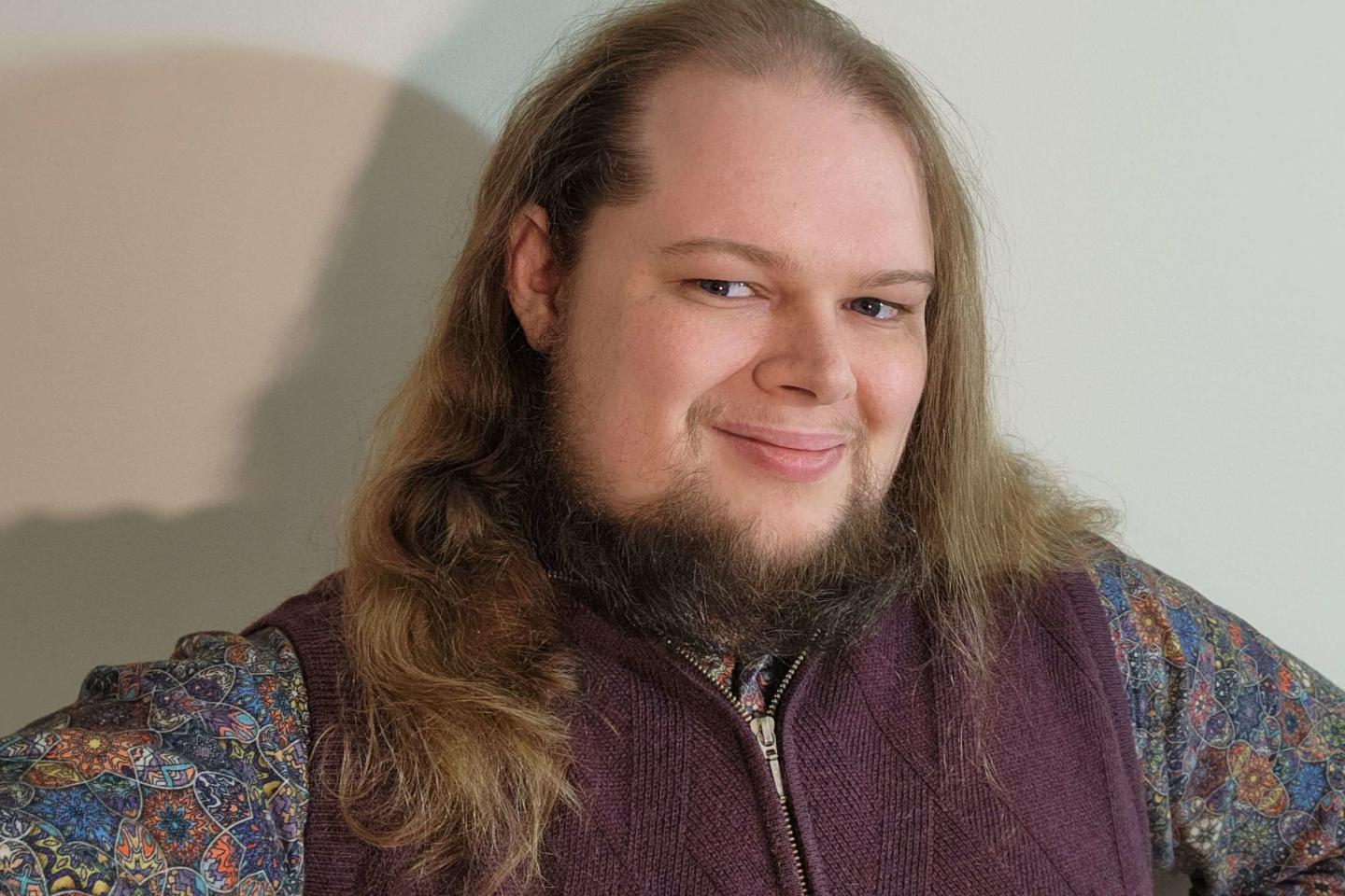 William Sparks smiles for a photo.